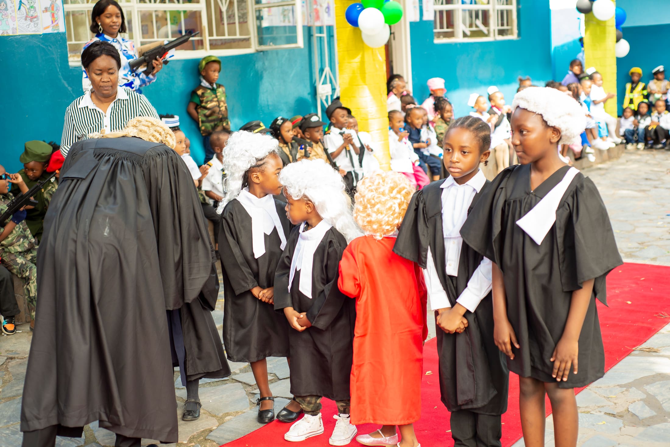 Pupils dressed as lawyers and judges